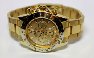Золотые часы Rolex Daytona