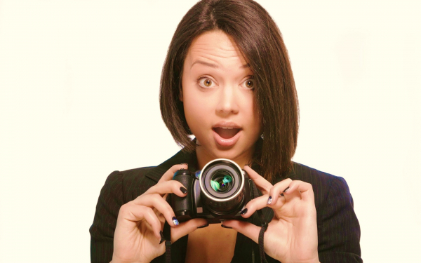 Девушка с фотоаппаратом