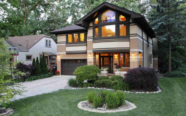 Кирпичный коттедж с гаражом