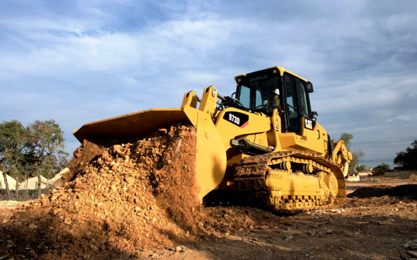 Гусеничный погрузчик CAT 973D