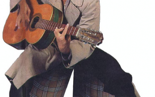 Челентано с гитарой