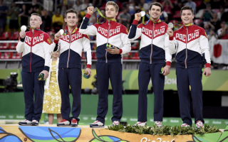 Мужская сборная России по спортивной гимнастике  завоевала серебряные олимпийские медали  в командном многоборье